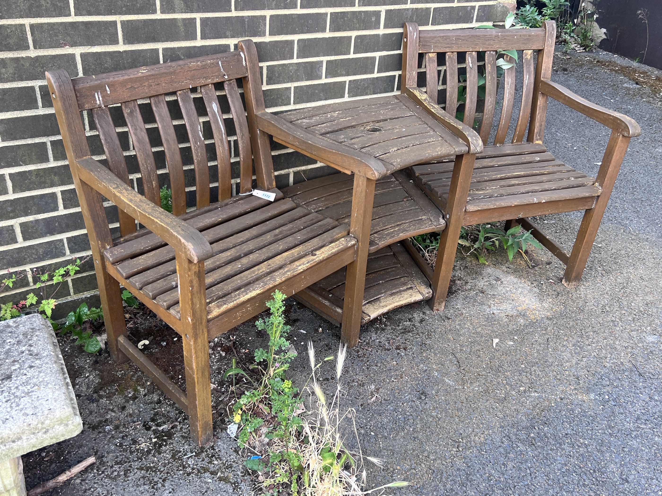 An Alexander Rose stained teak garden bench, length 180cm, depth 60cm, height 86cm